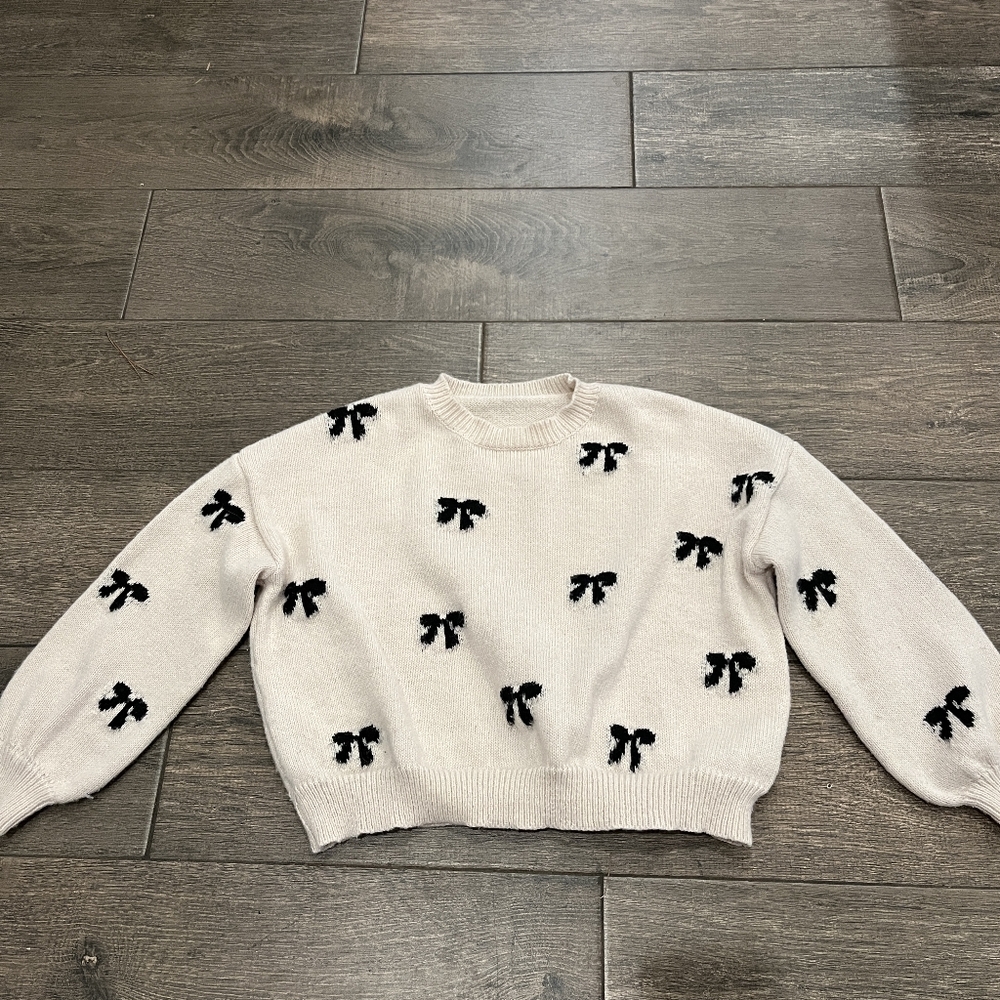 Women's Cream Sweater with Black Bow Accents